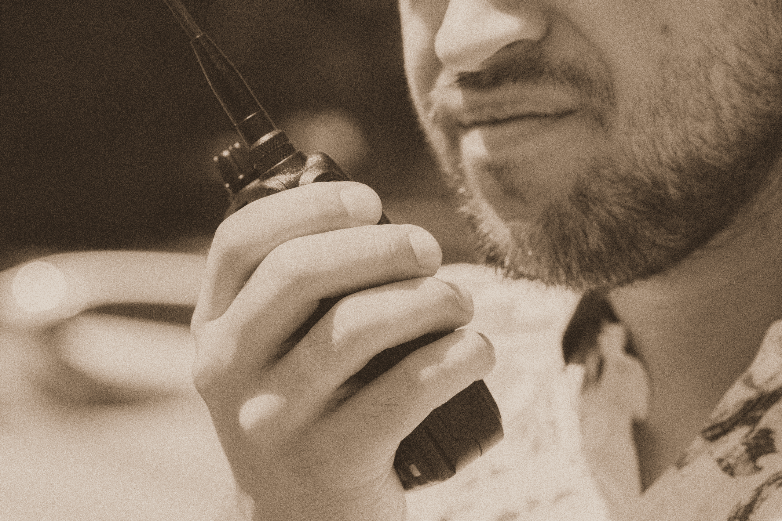 Man speaking in walkie-talkie